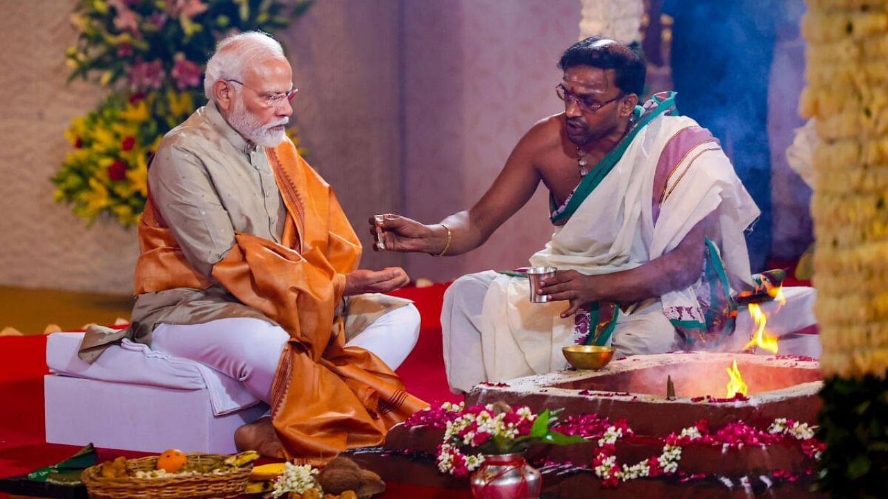 Prime Minister Narendra Modi performs 'havan' during the inauguration of the International Exhibition-cum-Convention Centre (IECC) complex at Pragati Maidan, in New Delhi, Wednesday, July 26, 2023. Credit: PTI Photo