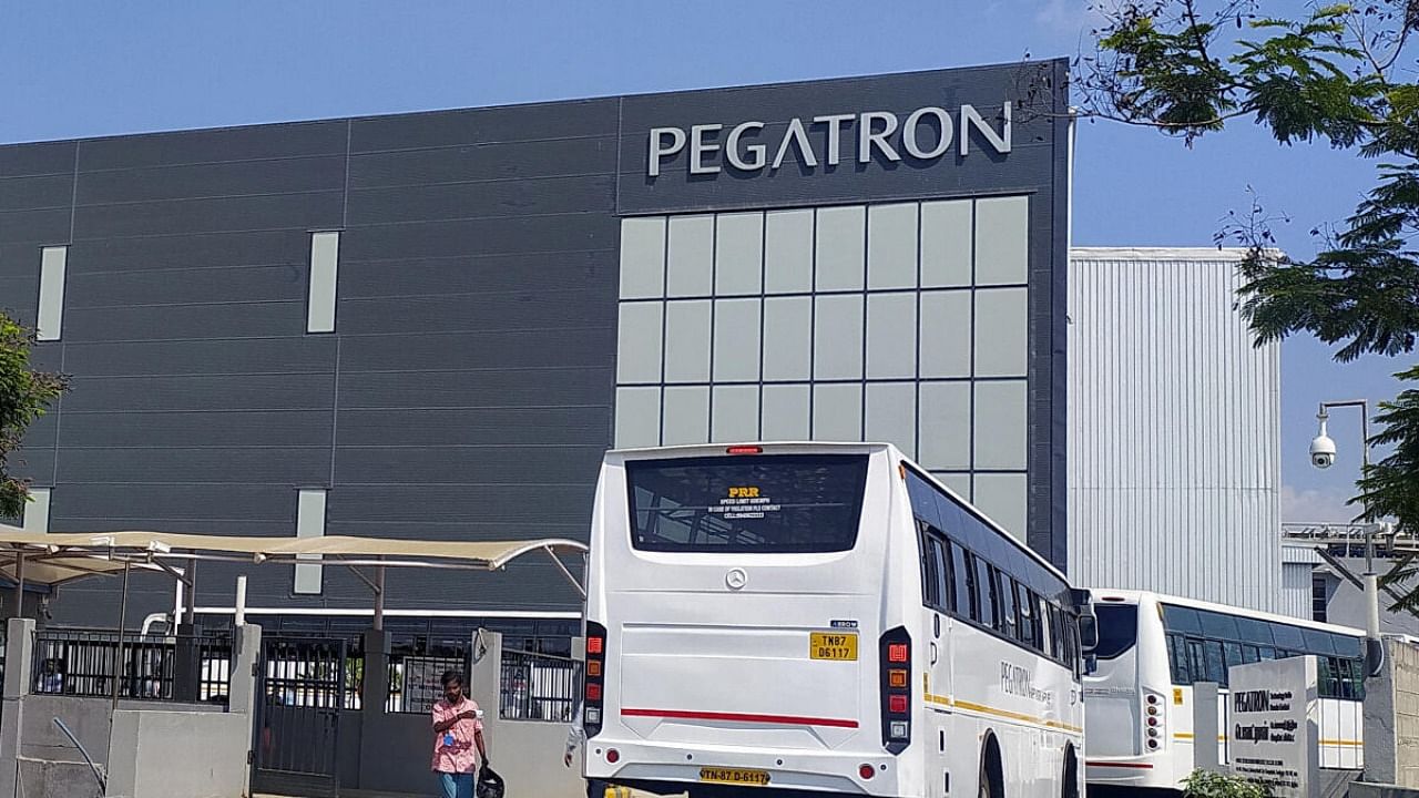 Employee buses enter the Pegatron facility near Chennai, India, March 7, 2023. Credit: Reuters Photo