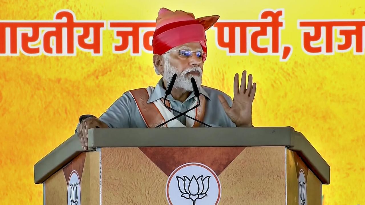 Prime Minister Narendra Modi speaks during a public meeting in Sikar. Credit: PTI Photo