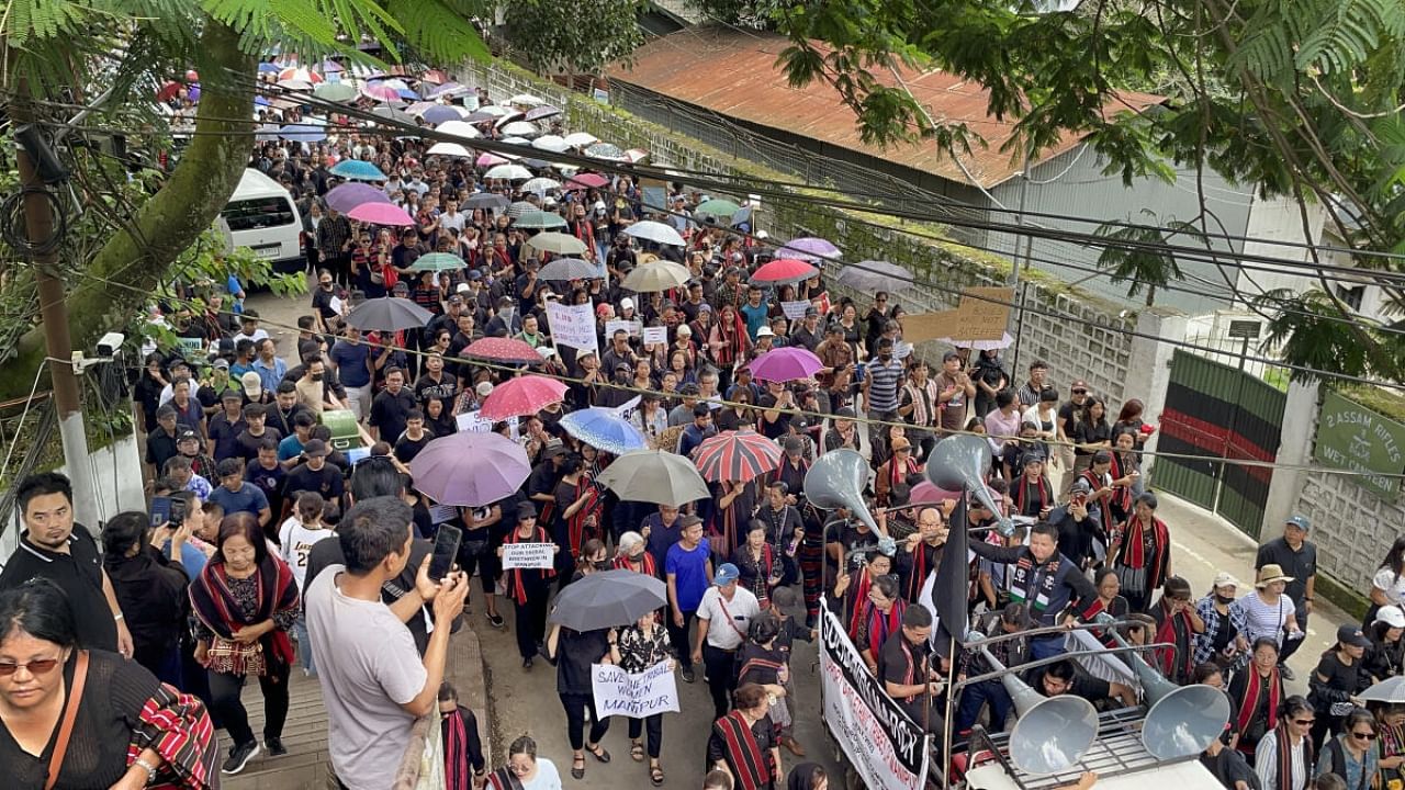 People in large numbers take part in a protest to extend solidarity to the Kuki or Zo ethnic people in strife-torn Manipur. Credit: PTI Photo