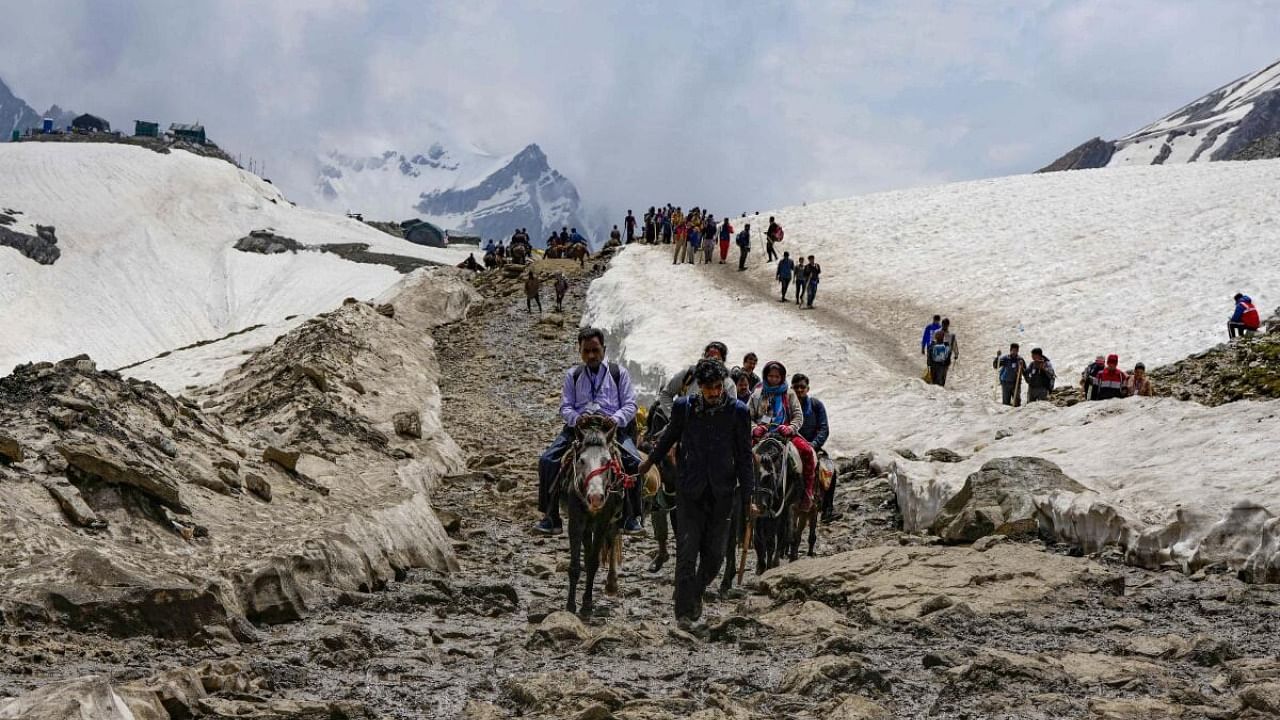 <div class="paragraphs"><p>Ponies carry pilgrims at Maha Ganesh Top on their way to the holy cave shrine through Pahalgam route, during Amarnath Yatra 2023, in Amarnath.</p></div>