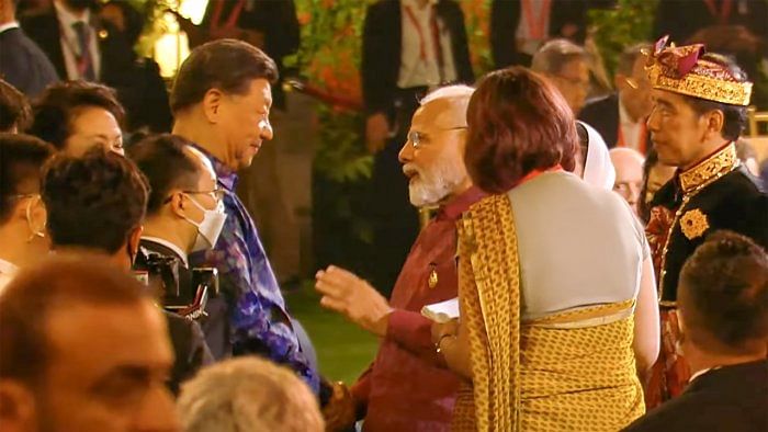 Prime Minister Narendra Modi with Chinese President Xi Jinping at the Welcoming Dinner during G20 Leaders' Summit, at the Garuda Wisnu Kencana Cultural Park, in Badung, Bali, Indonesia, November 15, 2022. Credit: PTI Photo  