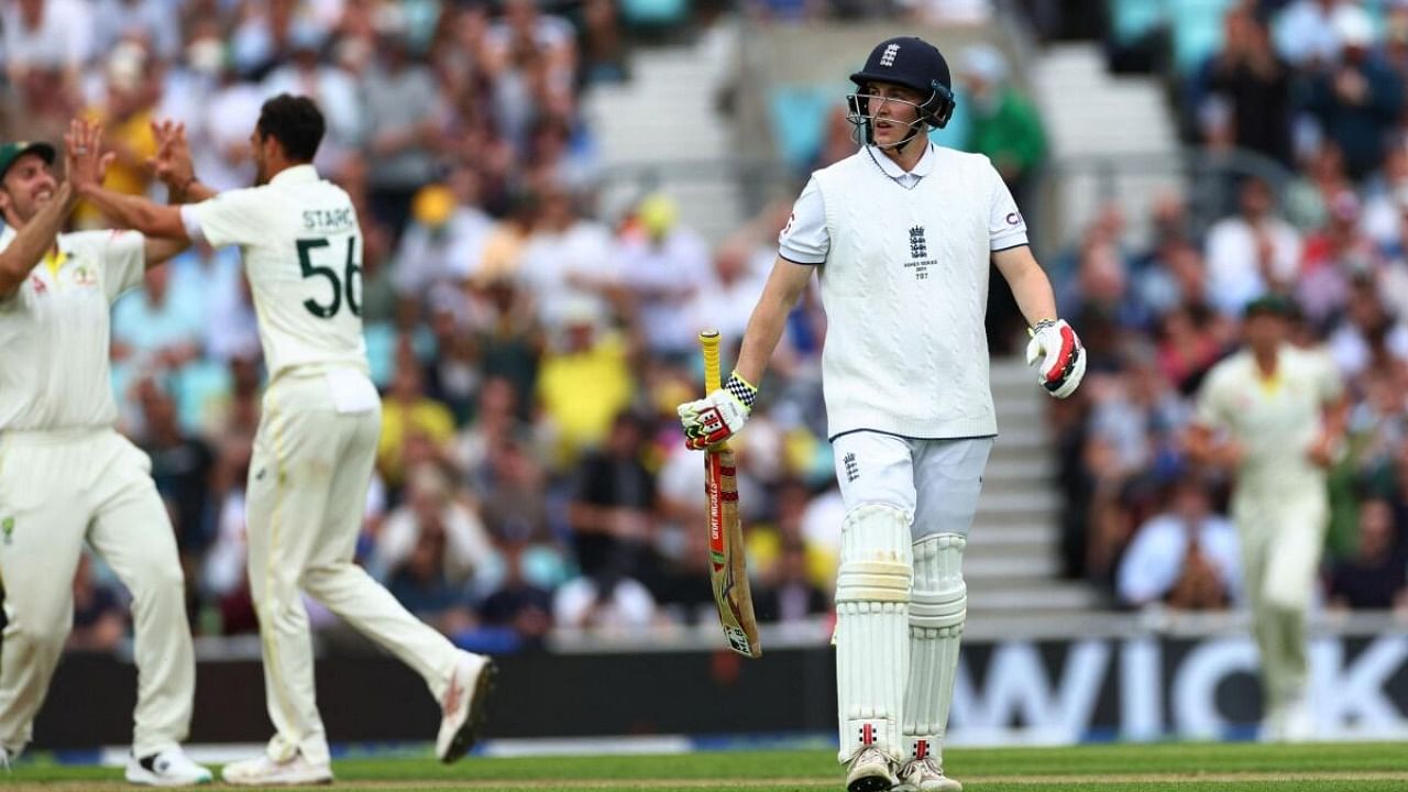 Harry Brook walks after losing his wicket, caught by Australia's Steve Smith. Credit: Reuters Photo