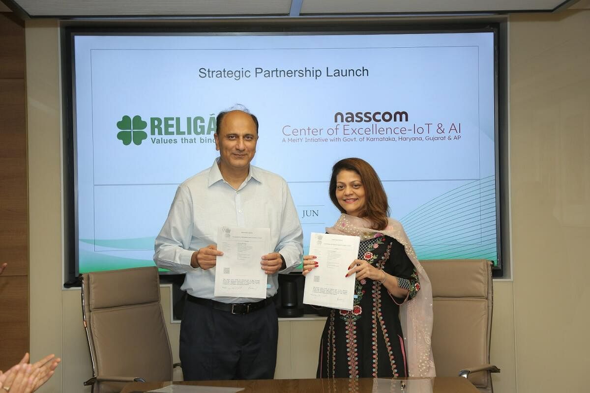 Sanjeev Malhotra, CEO, NASSCOM CoE & Dr. Rashmi Saluja, Executive Chairperson, Religare Enterprises Ltd in Bangalore on Thursday. Credit: Special arrangement
