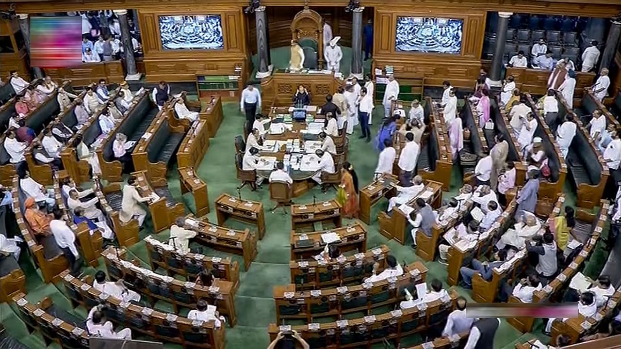 Opposition MPs protest in the Lok Sabha during the Monsoon session of Parliament, in New Delhi. Credit: PTI Photo