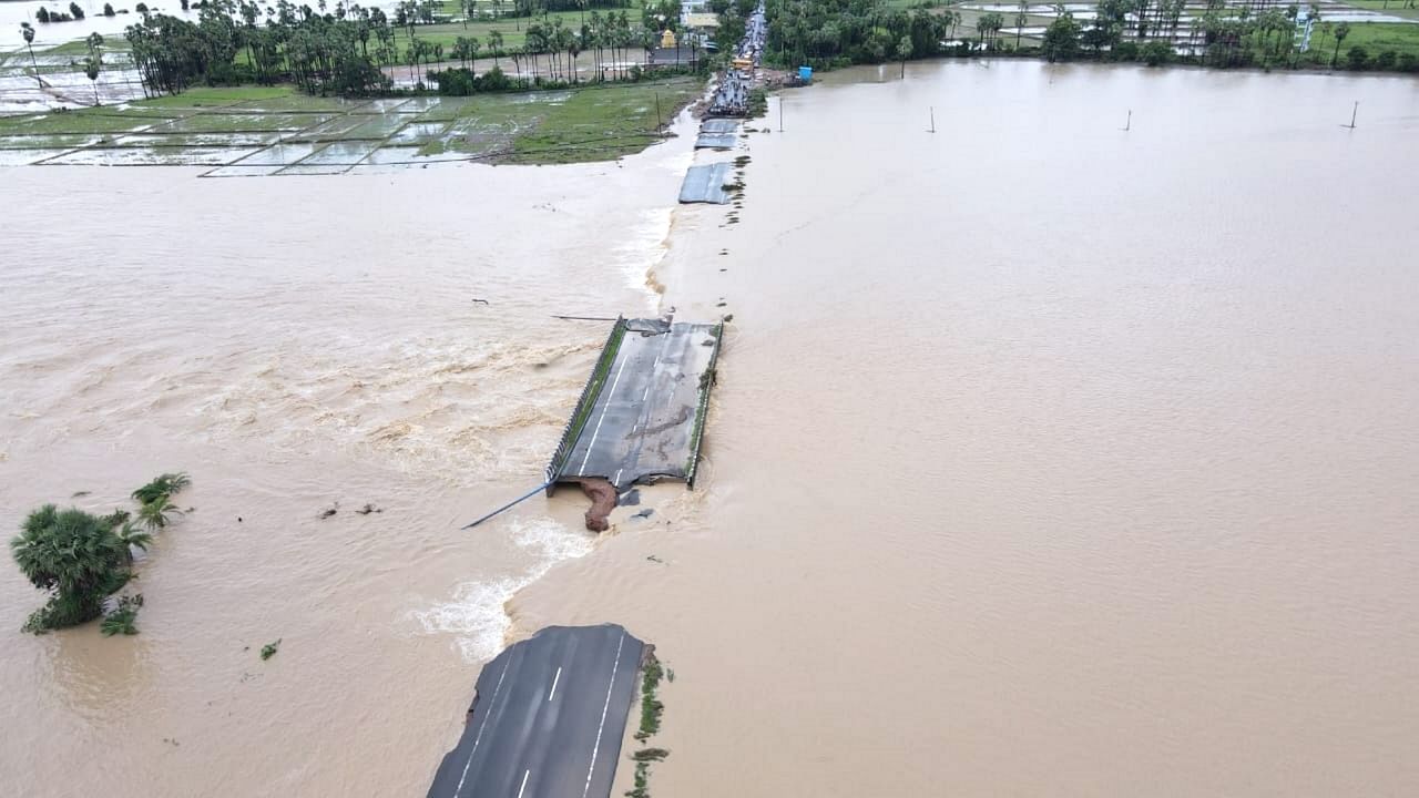 An aerial view of a partially damaged road submerged in the floodwaters of the swollen Godavari River, in Bhupalpally district, Friday, July 28, 2023. Credit: PTI Photo