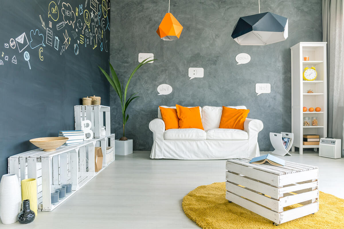 A room with furniture made out of crates.