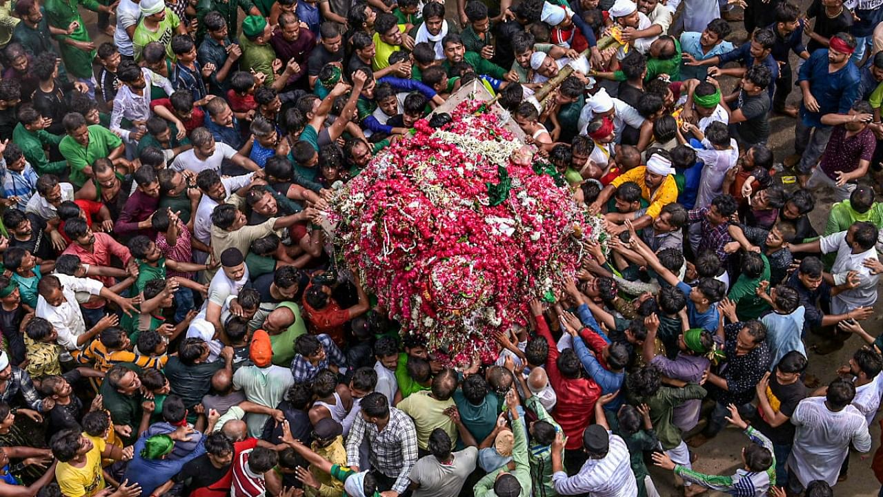Muslim devotees take part in a religious procession on the tenth day of the mourning period of Muharram, in Prayagraj, Saturday, July 29, 2023. Credit: PTI Photo
