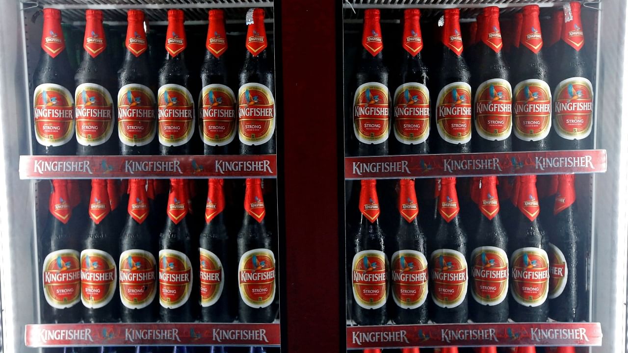 Kingfisher beer bottles are seen in a cooler at a liquor shop in Kolkata, India, September 13, 2019. Credit: Reuters File Photo