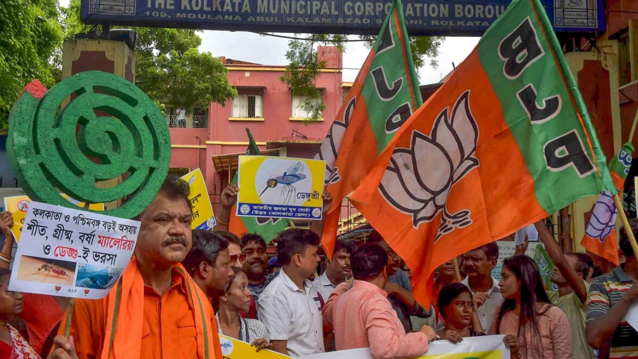 BJP activists during a protest demonstration against the State Government over rising number of dengue cases, in Kolkata. Credit: PTI File Photo