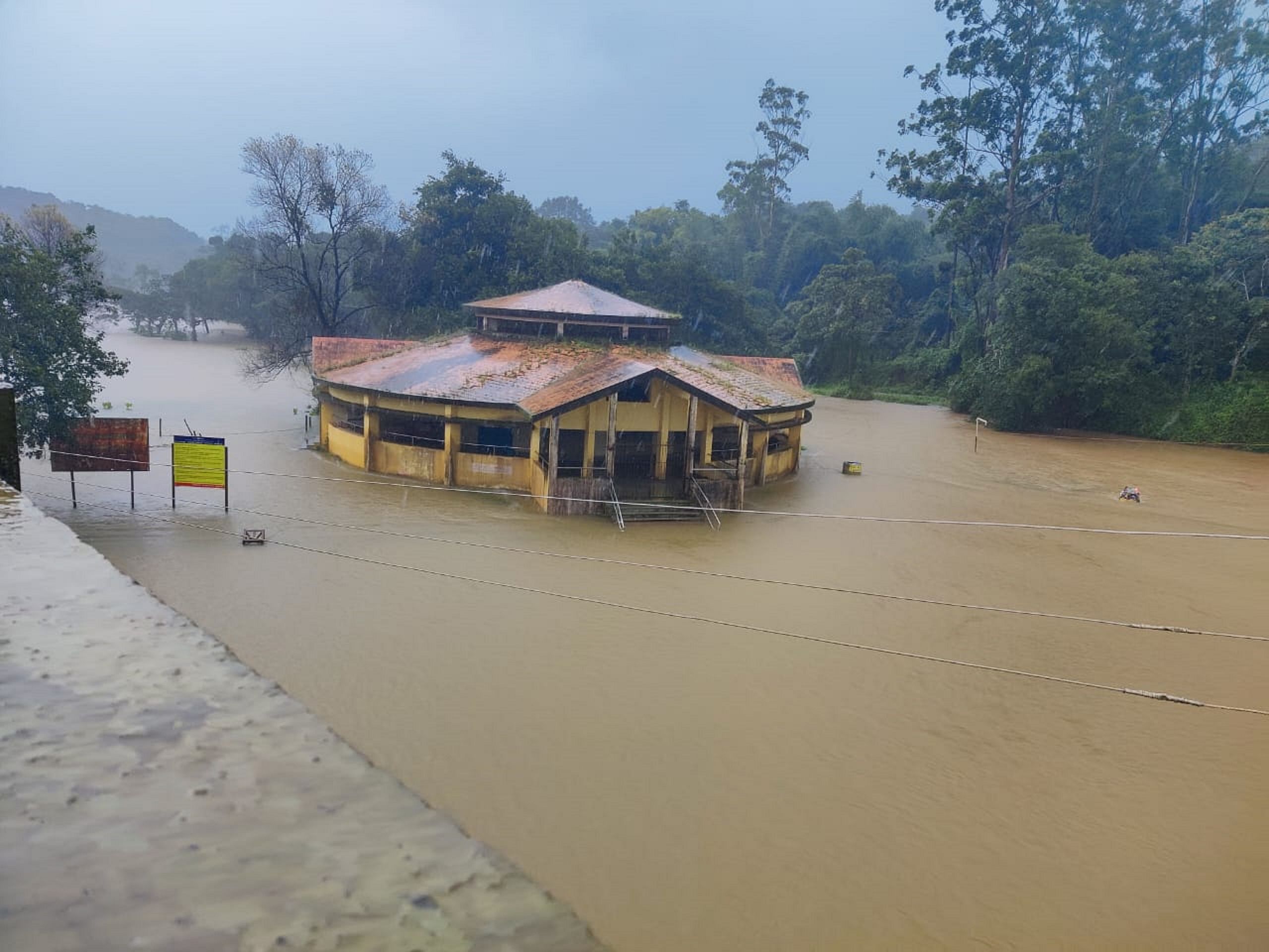 Bhagamandal's old shed is submerged in water. Credit: DH Photo
