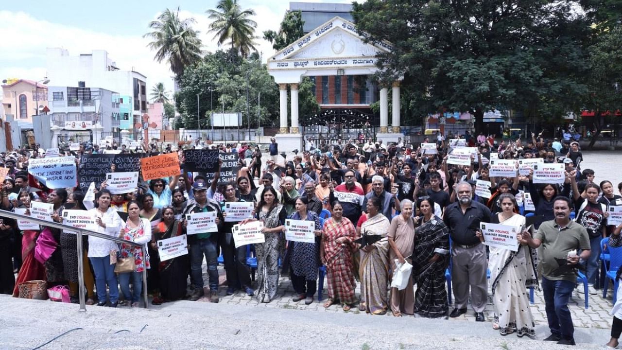 Nearly 1,000 people gathered at St Francis Xavier's Cathedral on Sunday to express solidarity with the victims of atrocities in Manipur. Credit: Special Arrangement