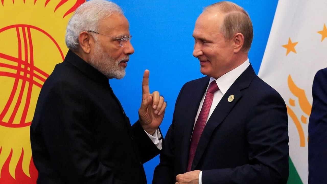 Narendra Modi (left) and Vladimir Putin (right). Credit: Reuters File Photo