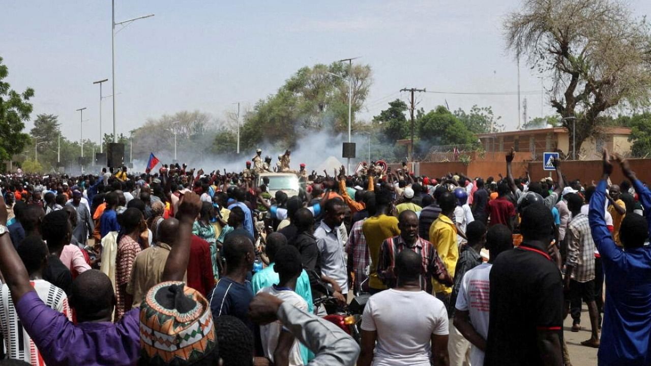 <div class="paragraphs"><p>Nigerien security forces launch tear gas to disperse pro-junta demonstrators gathered outside the French embassy, in Niamey, the capital city of Niger July 30, 2023. </p></div>