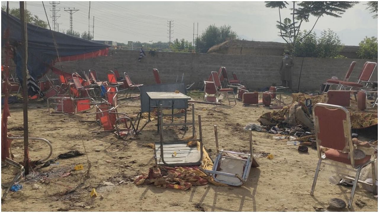 A general view of damaged property, following an explosion by a suicide bomber in Bajaur, Pakistan July 31, 2023 in this screen grab taken from a social media video. Credit: Bilal Yasir/via Reuters