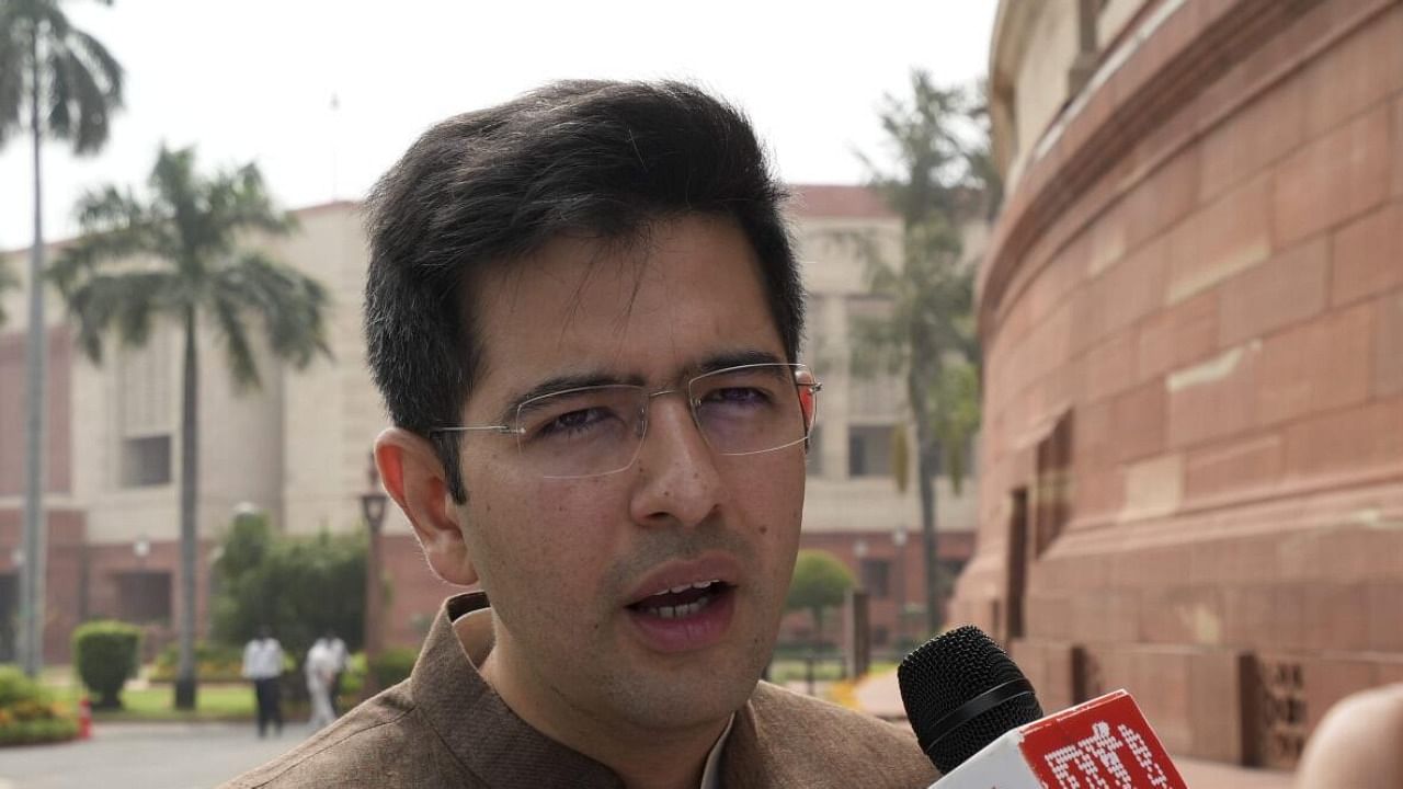 AAP MP Raghav Chadha talks to the media as he arrives at the Parliament House complex during ongoing Monsoon session, in New Delhi. Credit: PTI Photo