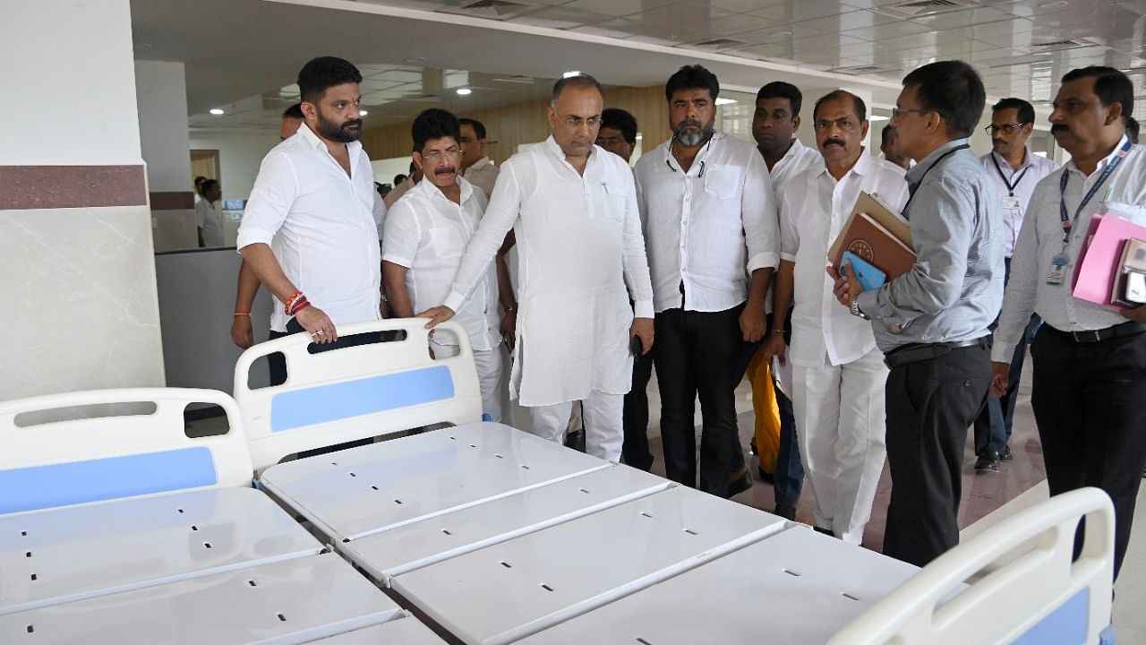 District-in-Charge Minister Dinesh Gundu Rao inspects the newly built surgical block under Smart City Mission, at Government Wenlock Hospital in Mangaluru on Tuesday. Credit: DH photo
