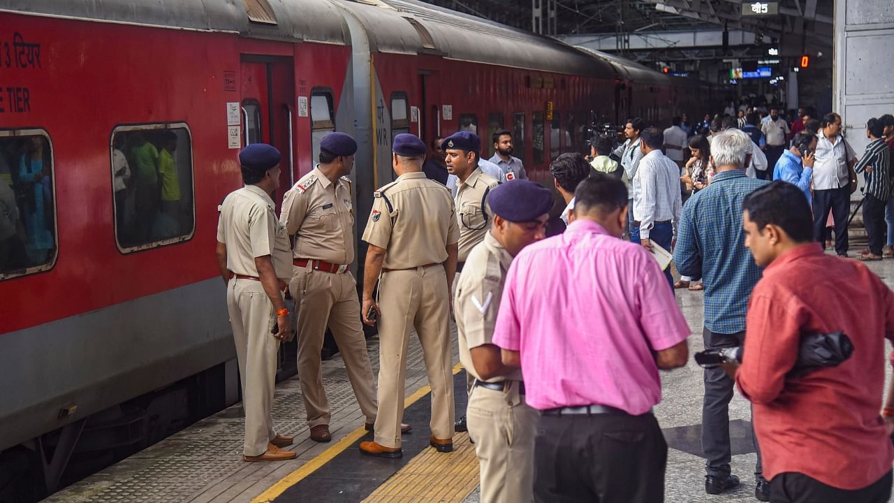 Police personnel inspect the Jaipur-Mumbai Central Express on board which a Railway Protection Force (RPF) jawan shot dead four people near Palghar railway station, in Mumbai, Monday, July 31, 2023. Credit: PTI Photo