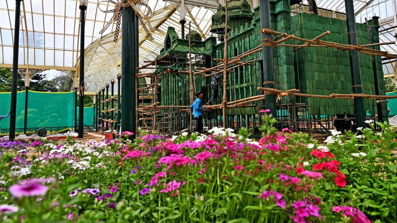 Preparations are underway for the Independence Day flower show at Lalbagh. Credit: DH PHOTO/PUSHKAR V