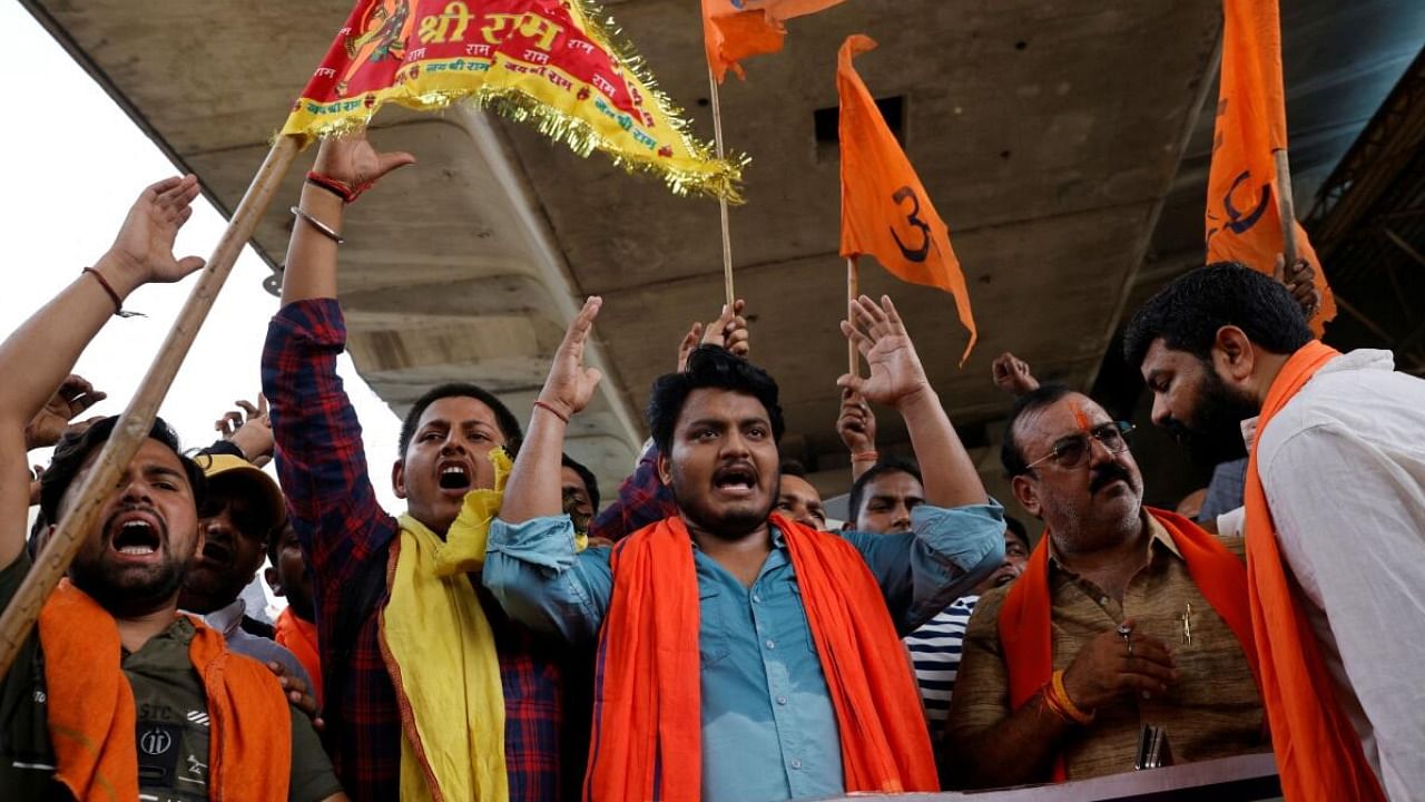 Bajrang Dal workers protest following clashes between Hindus and Muslims, in New Delhi. Credit: Reuters Photo