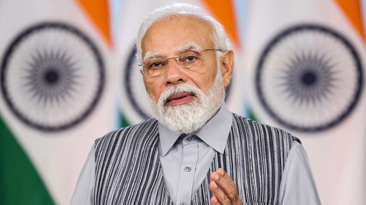 Prime Minister Narendra Modi digitally addresses the G20 Ministerial Conference on Women Empowerment, on Wednesday, Aug. 2, 2023. Credit: PTI Photo