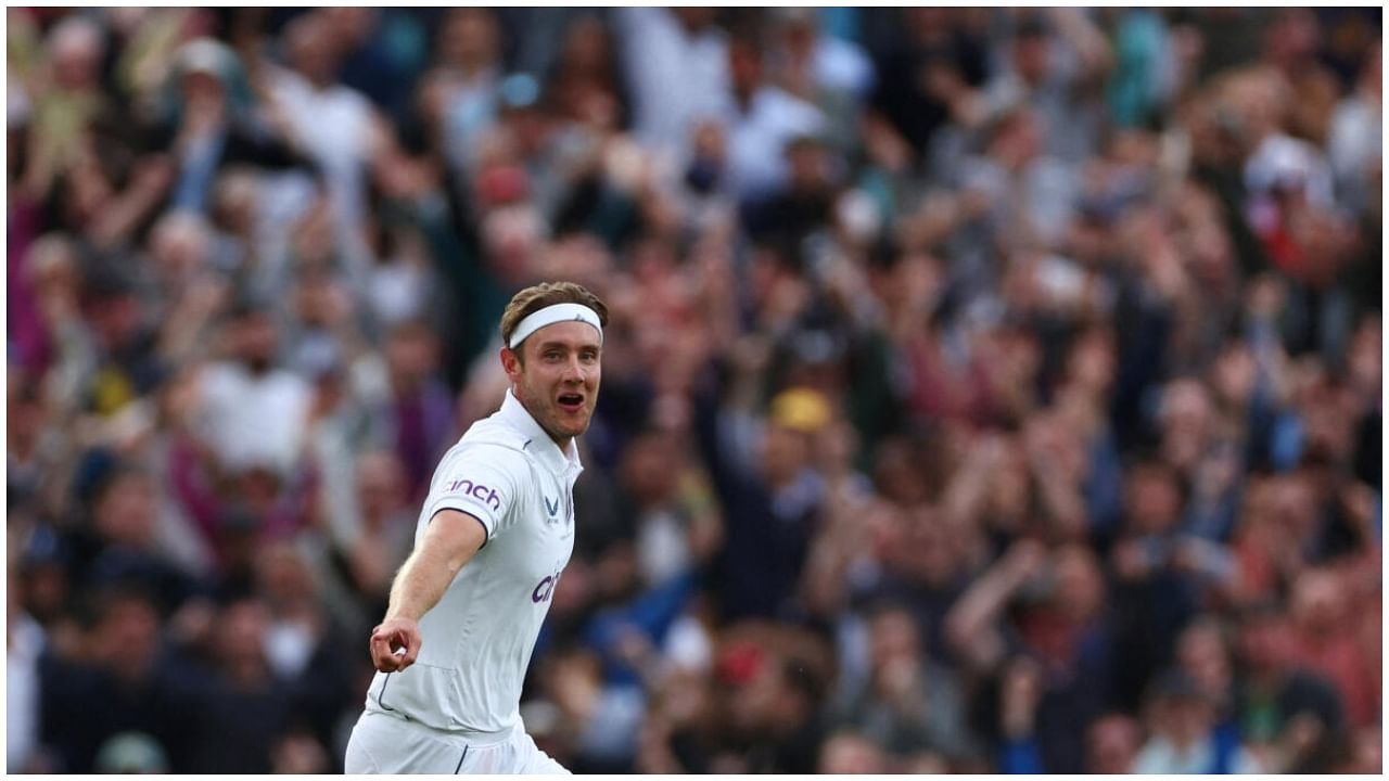  England's Stuart Broad celebrates after taking the wicket of Australia's Todd Murphy. Credit: Reuters Photo