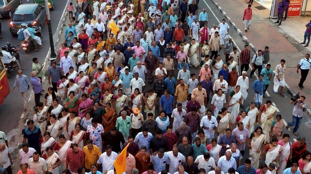 Supporters march during ‘Namajapa’ procession organised by the Nair Service Society (NSS) while protesting against Kerala Assembly Speaker A N Shamseer over his remarks about a Hindu deity, in Thiruvananthapuram, Wednesday, August 2, 2023. Credit: PTI Photo