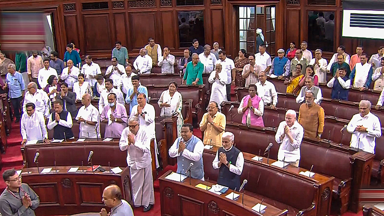 MPs welcome Rajya Sabha Chairman Jagdeep Dhankhar as he arrives in the House during the Monsoon session of Parliament, in New Delhi. Credit: PTI Photo