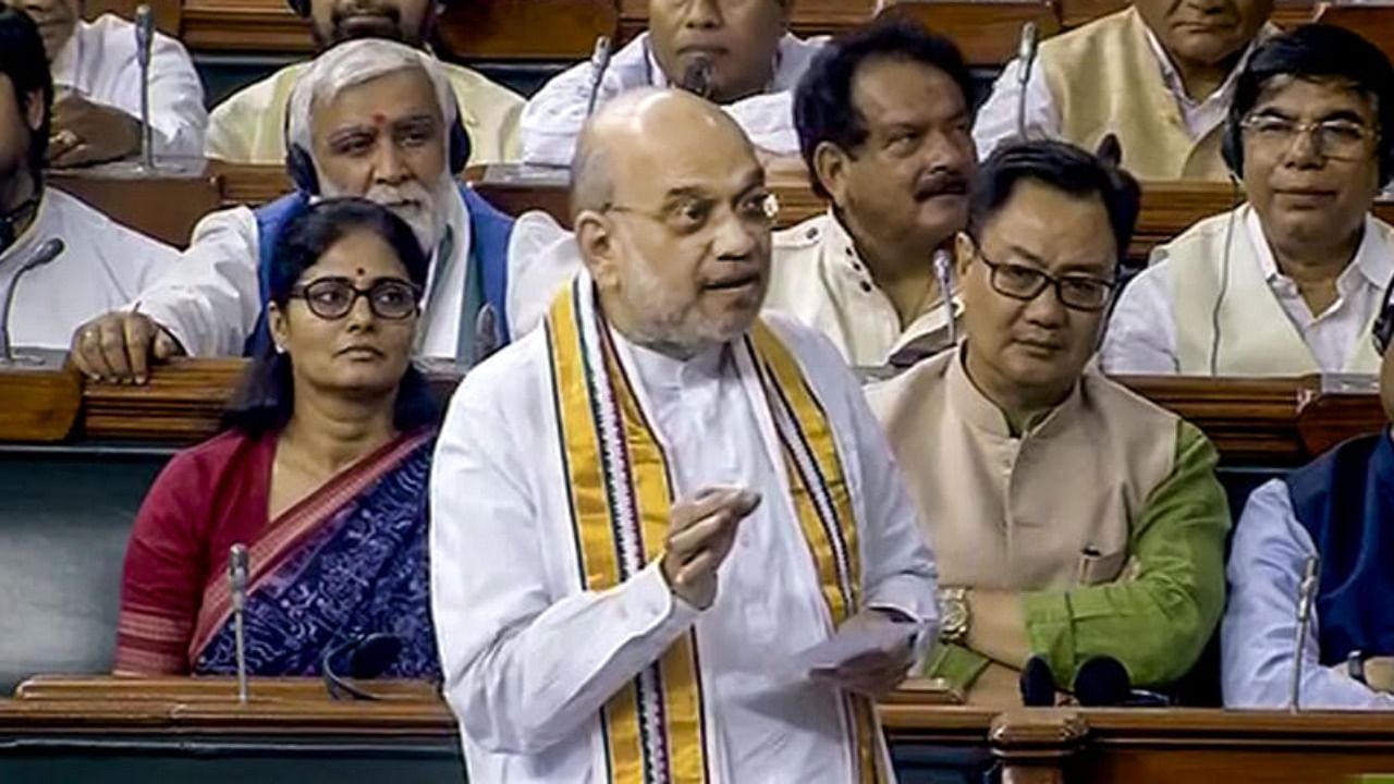 Union Home Minister Amit Shah speaks in the Lok Sabha during the Monsoon session of Parliament, in New Delhi, Thursday, Aug. 3, 2023. Credit: PTI Photo