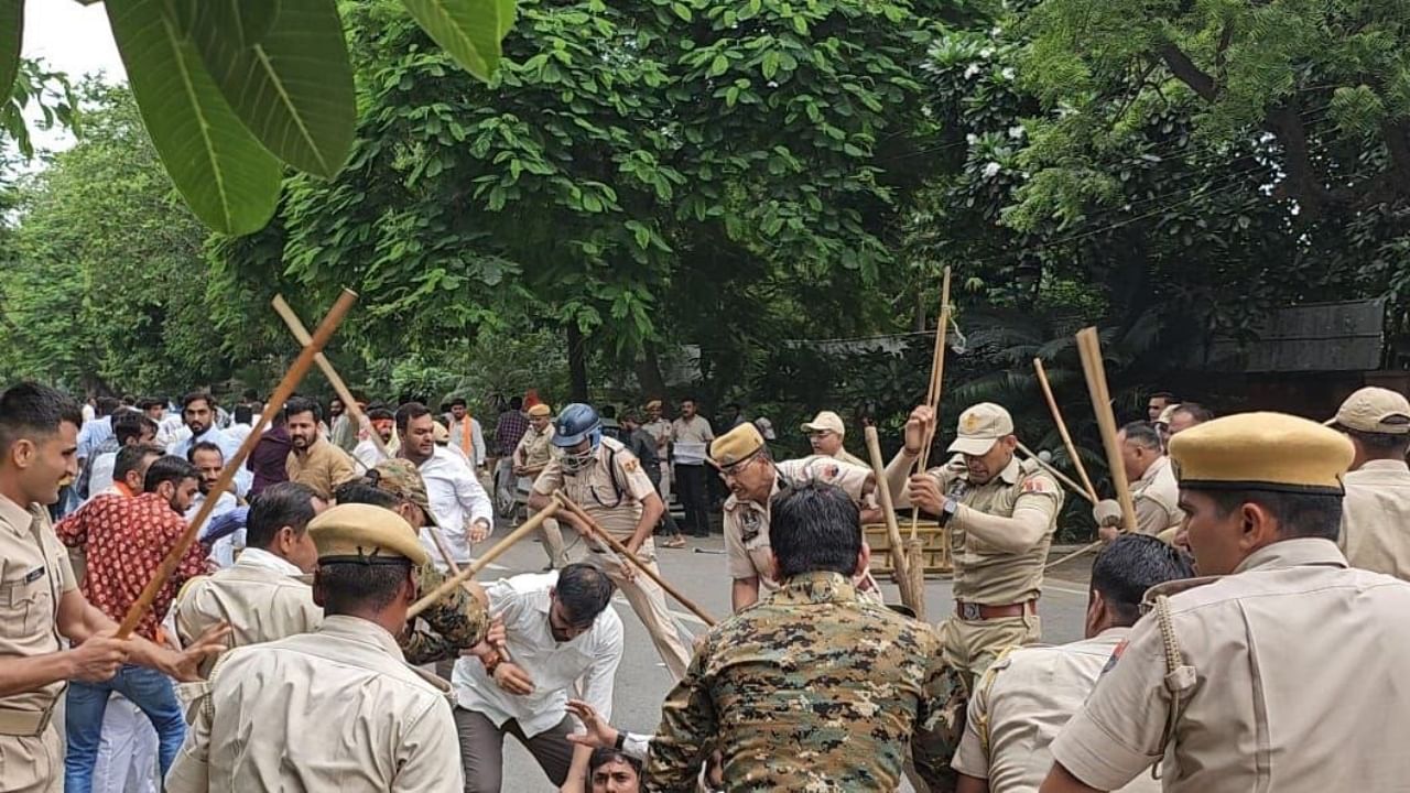 BJYM members getting lathi-charged by the cops. Credit: X/@BJYM