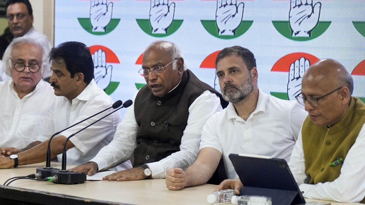 Congress President Mallikarjun Kharge with party leader Rahul Gandhi, Jairam Ramesh, K.C. Venugopal and Abhishek Manu Singhvi during a press conference after the Supreme Court stayed Gandhi's conviction in the 2019 criminal defamation case over his 'Modi surname' remark, restoring his status as an MP, at AICC headquarters in New Delhi, Friday, Aug. 4, 2023. Credit: PTI Photo