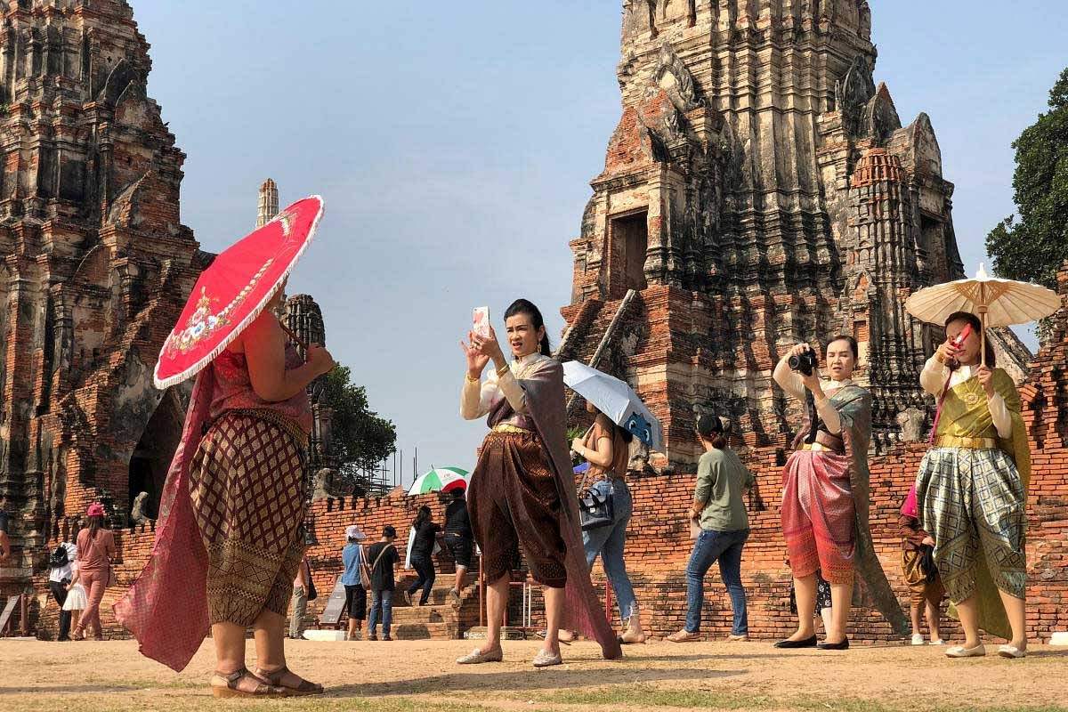 People dressed in traditional costumes pose for a picture, as interest for historical clothing rises within the country, in Ayutthaya, Thailand April 6, 2018. Picture taken April 6, 2018. Reuters Photo