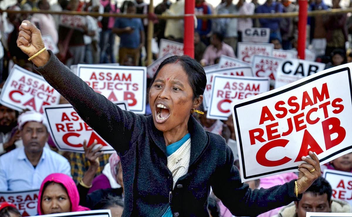 Students hold placards during a protest rally against the Citizenship Amendment Bill, in Guwahati. (PTI photo)