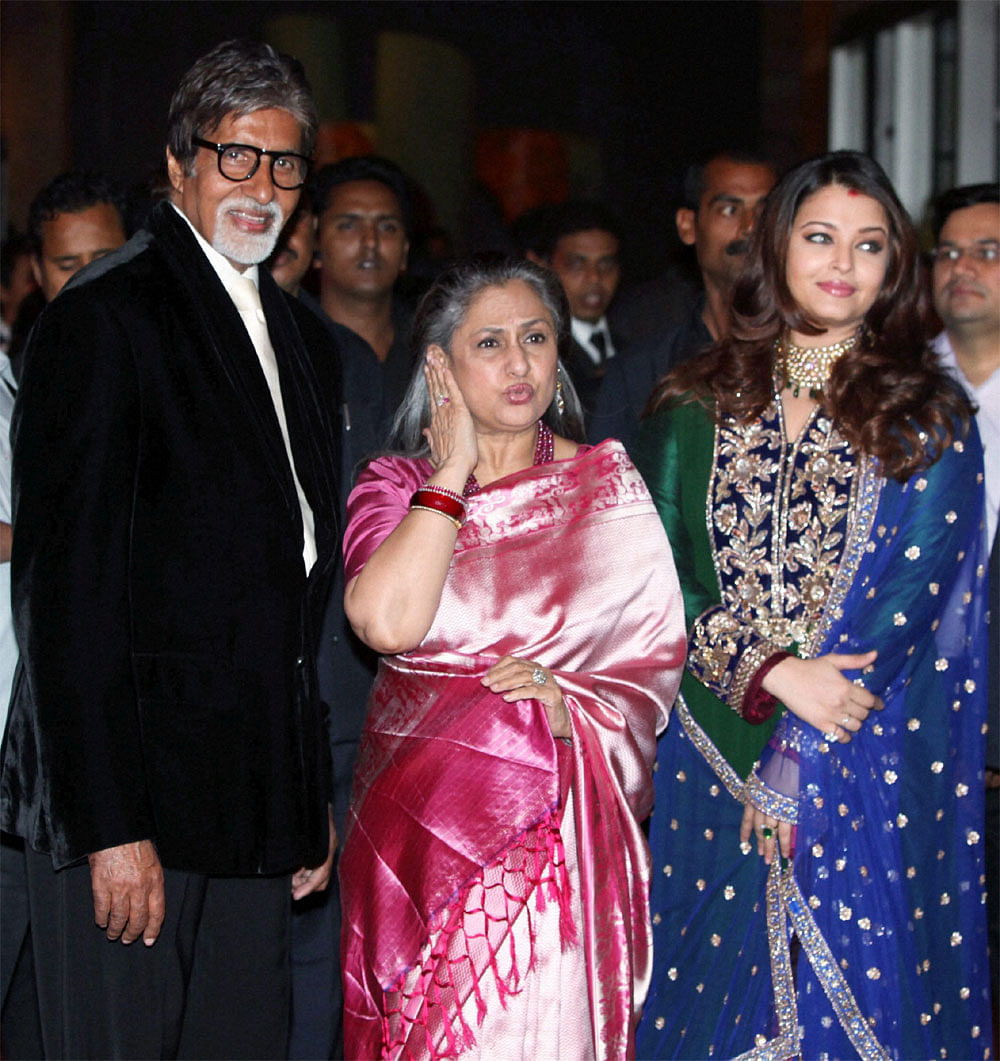 Amitabh Bachchan along with Jaya and Aishwarya arrives for the reception of  Riteish Deshmukh and Genelia D'Souza in Mumbai on Saturday. PTI Photo
