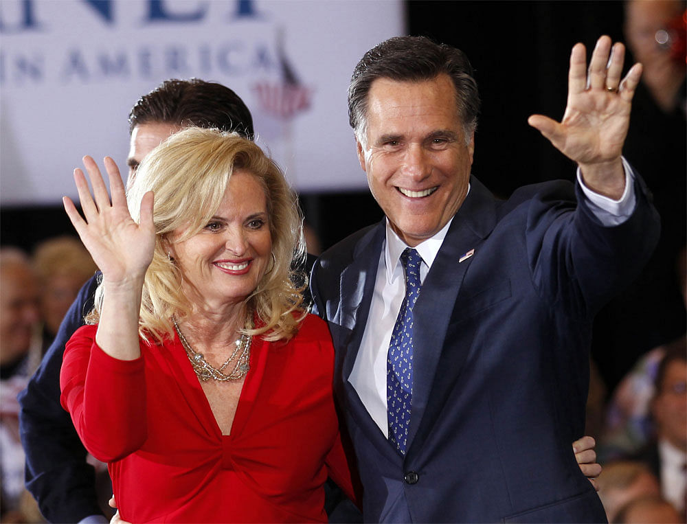 Republican presidential candidate, former Massachusetts Gov. Mitt  Romney, waves to supporters with his wife Ann at his election watch  party after winning the Michigan primary in Novi, Mich., Tuesday, Feb.  28, 2012. AP Photo
