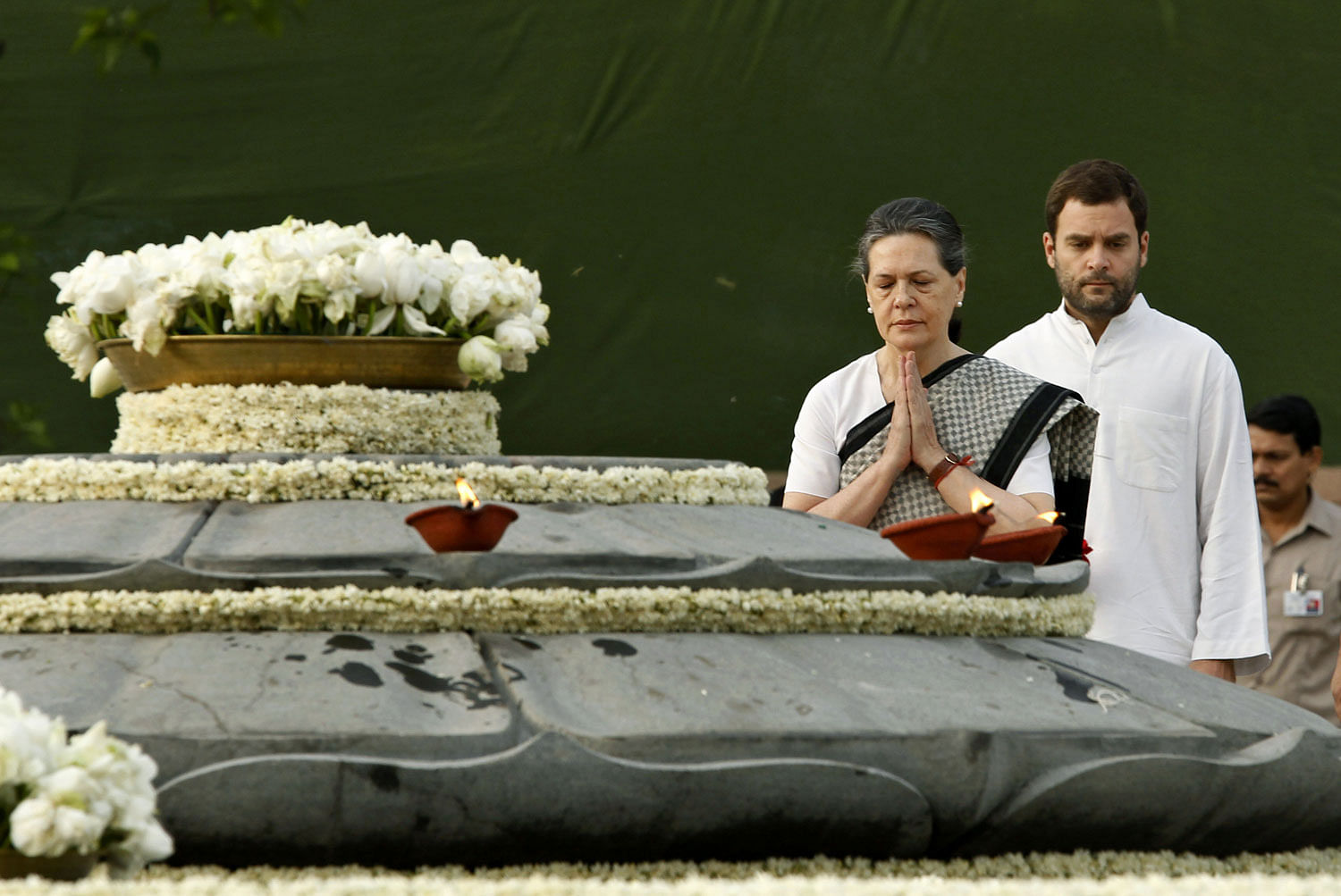 Congress Party President and wife of former Indian Prime Minister Rajiv Gandhi, Sonia Gandhi, right, and her son Rahul Gandhi, pay tribute at Rajiv’s memorial to mark his death anniversary in New Delhi on May 21, 2012. AP
