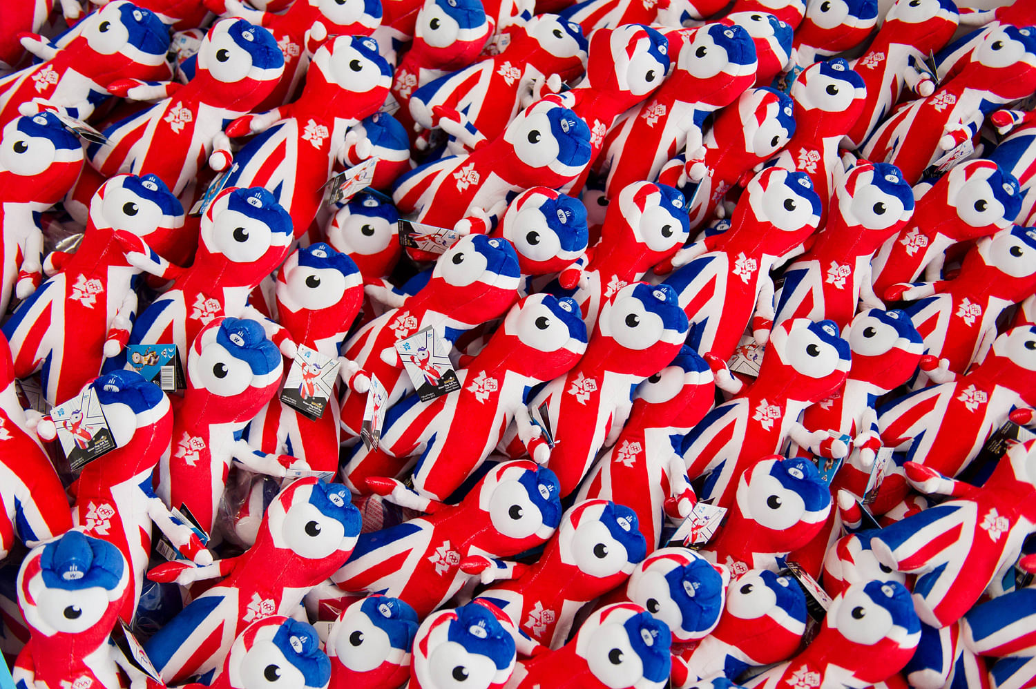 Stuffed toys of the Olympic mascot are stacked in one of the stores inside the Olympic Village where athletes will live for the duration of the London 2012 Games in east London.AFP