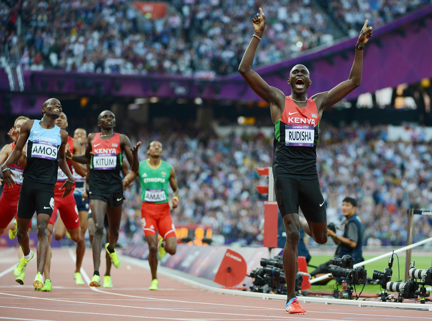 Kenya's gold medalist David Lekuta Rudisha wins the men's 800 final at the athletics event during the London 2012 Olympic Games on August 9, 2012 in London. Rudisha won the men's 800 metres Olympic title in a new world record of 1min 40.91sec. AFP 