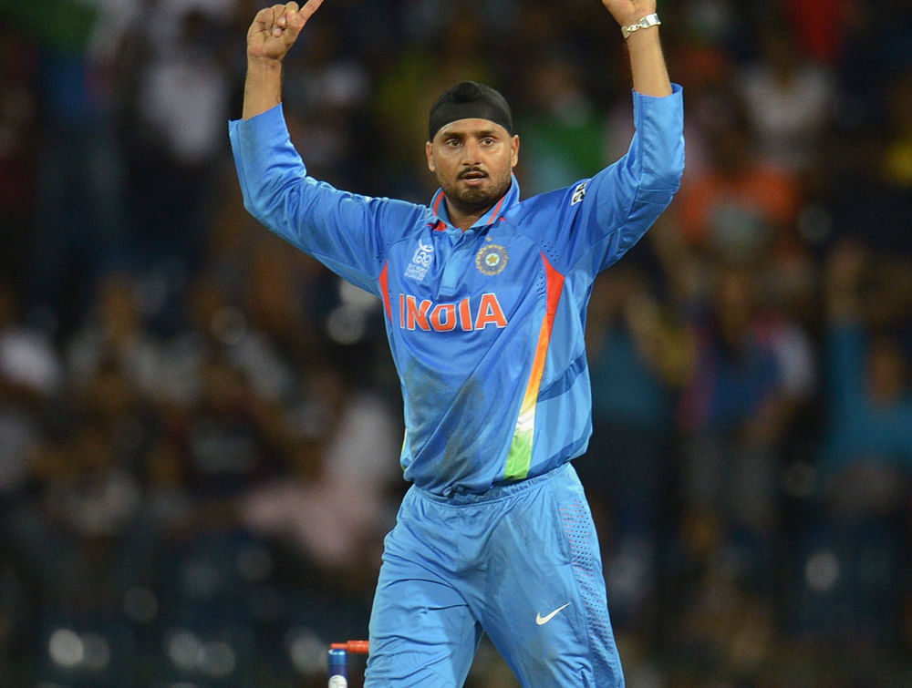 India's Harbhajan Singh celebrates after dismissing England's Tim Bresnan during their ICC World Twenty20 group A match at the R Premadasa Stadium in Colombo September 23, 2012. REUTERS/Philip Brown