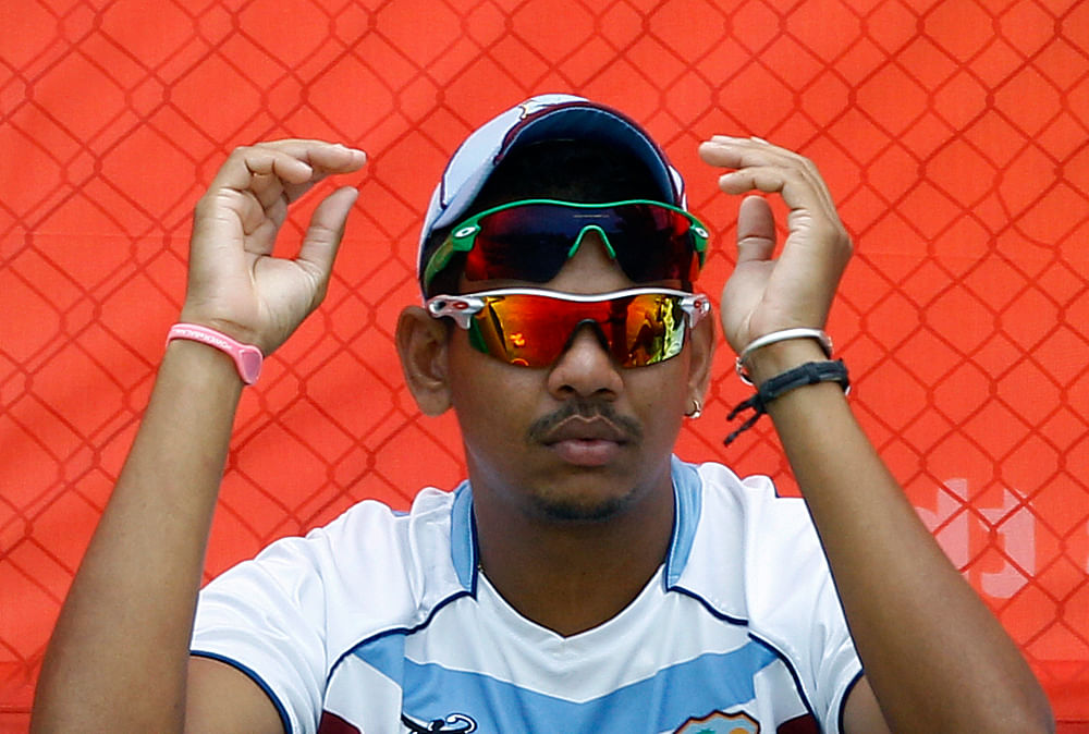 West Indies' cricketer Sunil Narine waits to bowl in the nets during a training session ahead of their ICC Twenty20 Cricket World Cup match against England in Pallekele, Sri Lanka, Wednesday, Sept. 26, 2012. AP