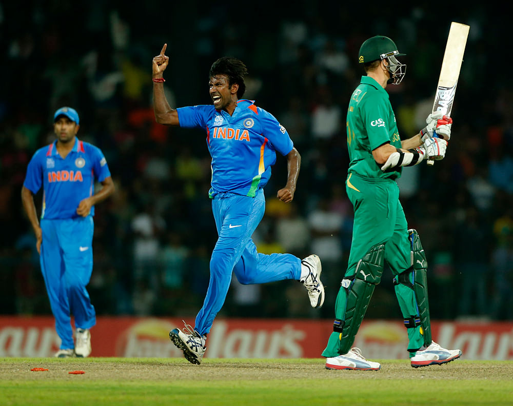 Lakshmipathy Balaji, center, celebrates taking the wicket of South Africa's batsman Morne Morkel during their ICC Twenty20 Cricket World Cup Super Eight match between India and South Africa in Colombo, Sri Lanka, Tuesday, Oct. 2, 2012. AP