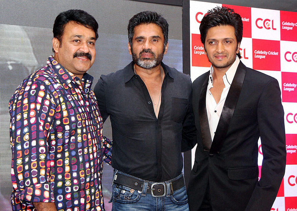 Actors Mohanlal, Suniel Shetty and Riteish Deshmukh during launch of the 3rd season of Celebrity Cricket League T20 in Mumbai on Friday evening. PTI