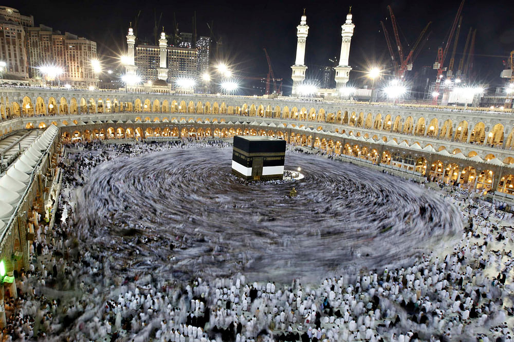 Muslim pilgrims circle the Kaaba and pray at the Grand mosque during the annual haj pilgrimage in the holy city of Mecca October 23, 2012, ahead of Eid al-Adha which marks the end of haj. On October 25, the day of Arafat, millions of Muslim pilgrims ...