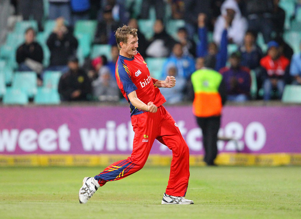Chris Morris of the Lions celebrates during the Karbonn Smart CLT20 Semi Final match between Bizhub Highveld Lions and Delhi Daredevils at Sahara Stadium Kingsmead on October 25, 2012 in Durban. AFP