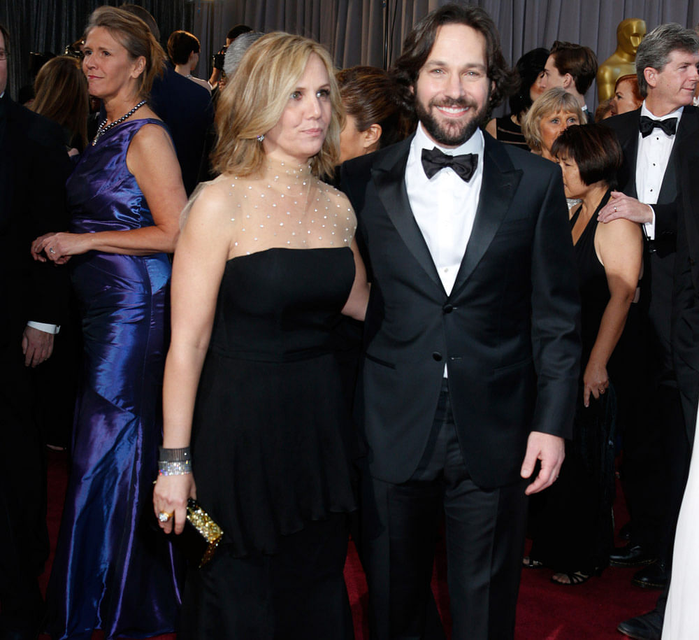 Actor Paul Rudd, right, and Julie Yaeger  arrive at the Oscars at the Dolby Theatre on Sunday Feb. 24, 2013, in Los Angeles.
