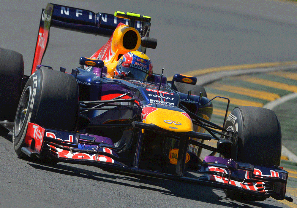 Red Bull driver Mark Webber of Australia powers through a corner during the first practice session for the Formula One Australian Grand Prix in Melbourne on March 15, 2013. AFP PHOTO