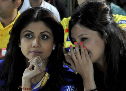 RR's owner Shilpa Shetty and CSK's captain M S Dhoni's wife Sakshi (L)  during an IPL 6 match between Rajasthan Roylas and Chennai Super Kings  in Jaipur on Sunday. PTI Photo