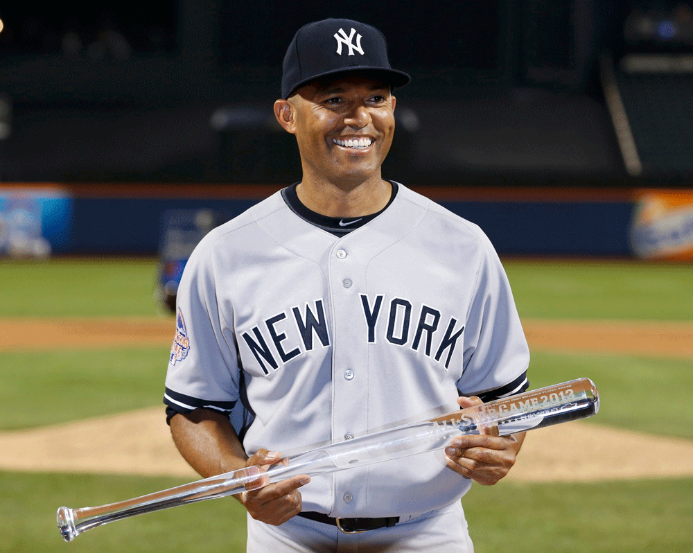 New York Yankees pitcher Mariano Rivera holds a clear bat after being named MVP of the 2013 All-Star Game following Major League Baseball's All-Star Game in New York, July 16, 2013. REUTERS