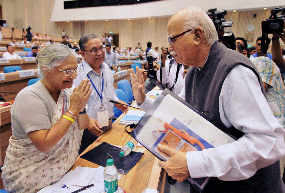 New Delhi : Senior BJP leader LK Advani with Delhi Chief Minister Sheila  Dikshit at the Sixteenth meeting of the National Integration Council in  New Delhi on Monday.PTI Photo by Subhav Shukla