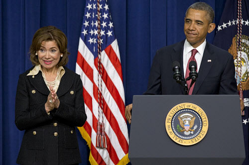 Maria Contreras-Sweet, founder and board chairman of a Latino-owned  community bank in Los Angeles, left, thanks the crowd as President  Barack Obama announces he will nominate her to new head the Small  Business Administration (SBA), Wednesday, Jan....